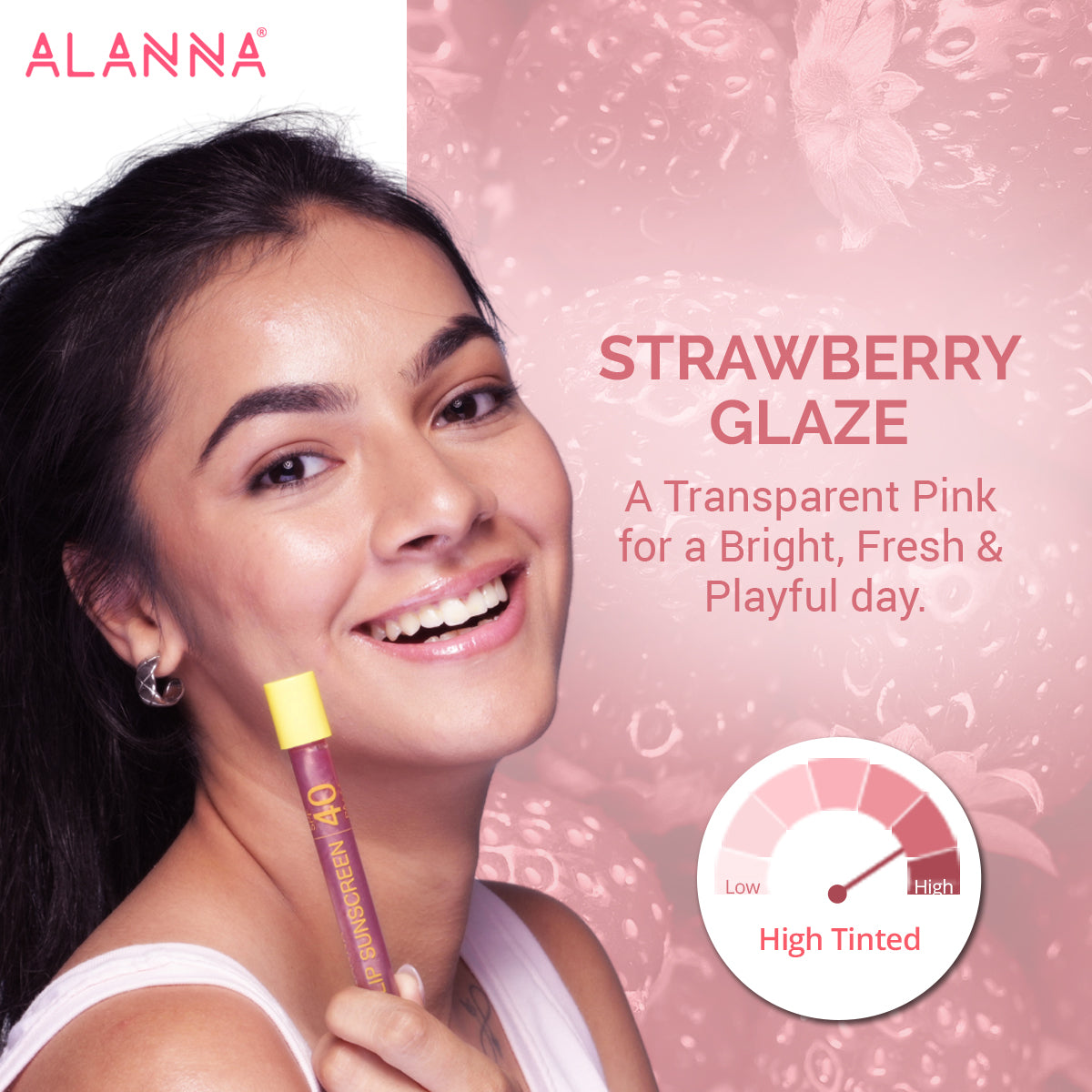 A girl holding  ALANNA's Strawberry Lip Gloss with SPF